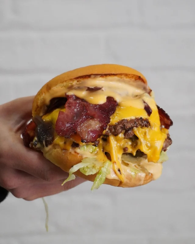 Full Works Brgr 🍔 

3x smashed angus beef patties, lettuce, gherkins, caramelised onions, maple lamb bacon and bro's brgr sauce in a toasted bun.

Have you tried this one? 👇

Available in-store:
📞 Call and collect 01924 907350
🚚 Or for delivery via @ubereats_uk @deliveroo @justeatuk

#beefburger #burger #brgrbro #leedsfood #leedstakeaway #batley